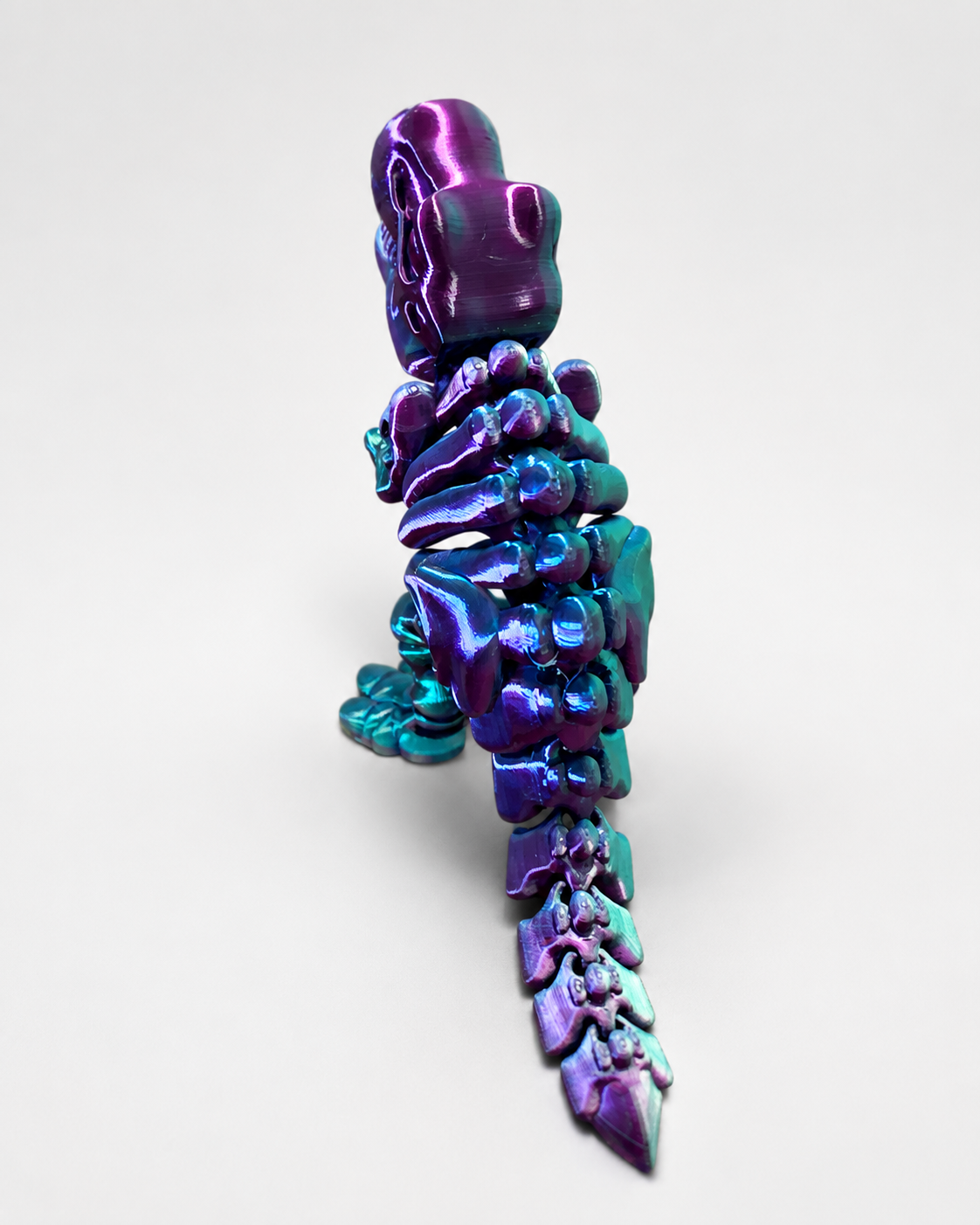 Metallic Rainbow Articulated Dinosaur Skeleton – 3D Printed Collectible