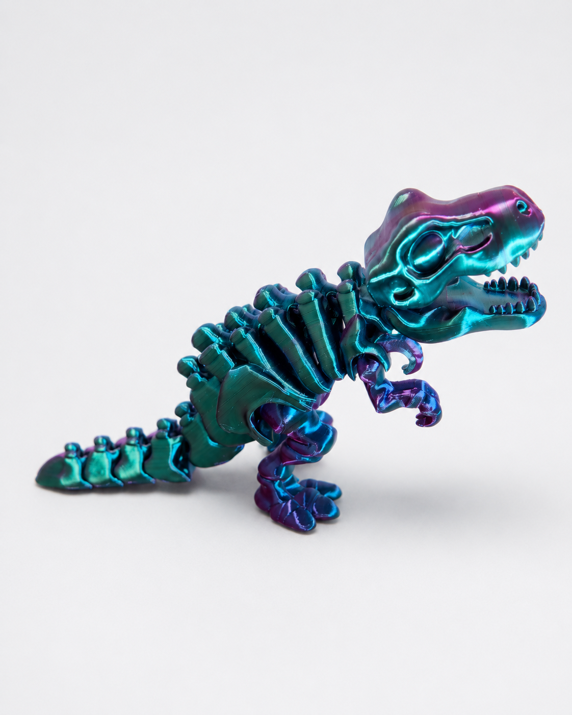Metallic Rainbow Articulated Dinosaur Skeleton – 3D Printed Collectible